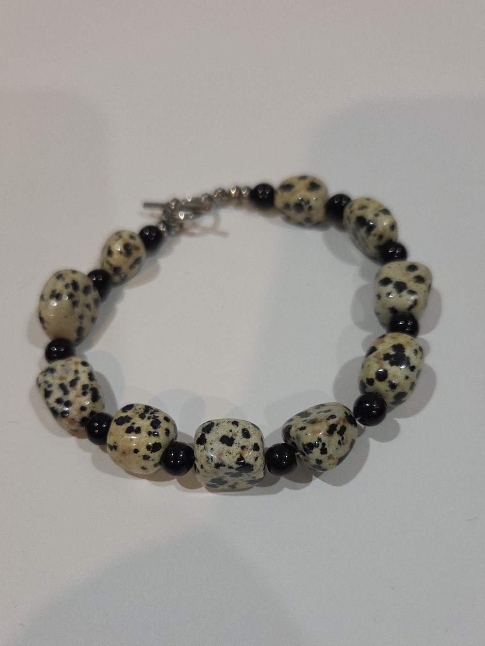DALMATION JASPER AND ONYX BRACELET WITH STERLING T CLASP